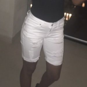 White distressed jean shorts